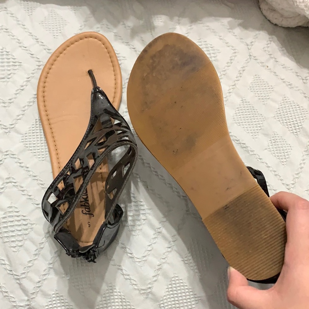 Black sandals.